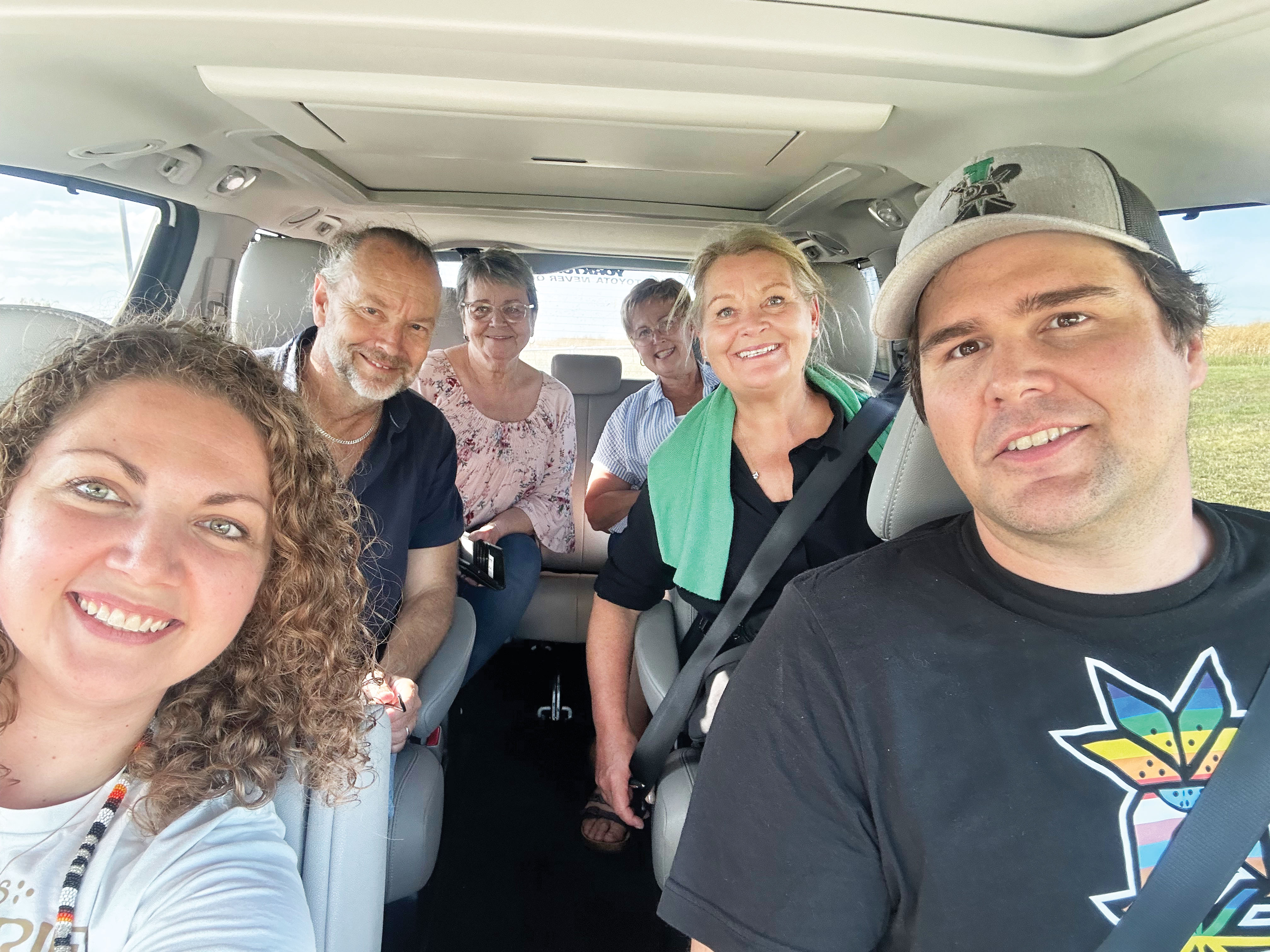 Ola and Lena with people in Stockholm. Front seat: Samantha and Jamie Smart-Sondergaard. Middle seat: Ola and Lena. Back seat: Bev Szumutku and Barb Persson.